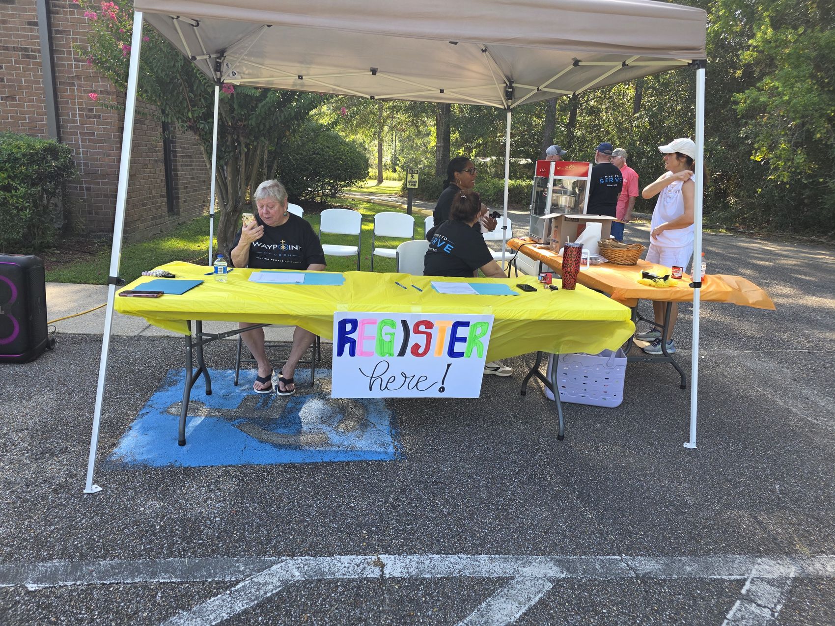 Registration tent at Waypoint's back to school bash