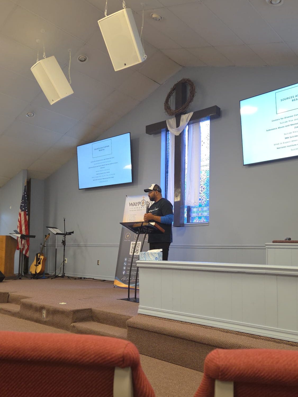 Pastor Kelsey welcoming guests